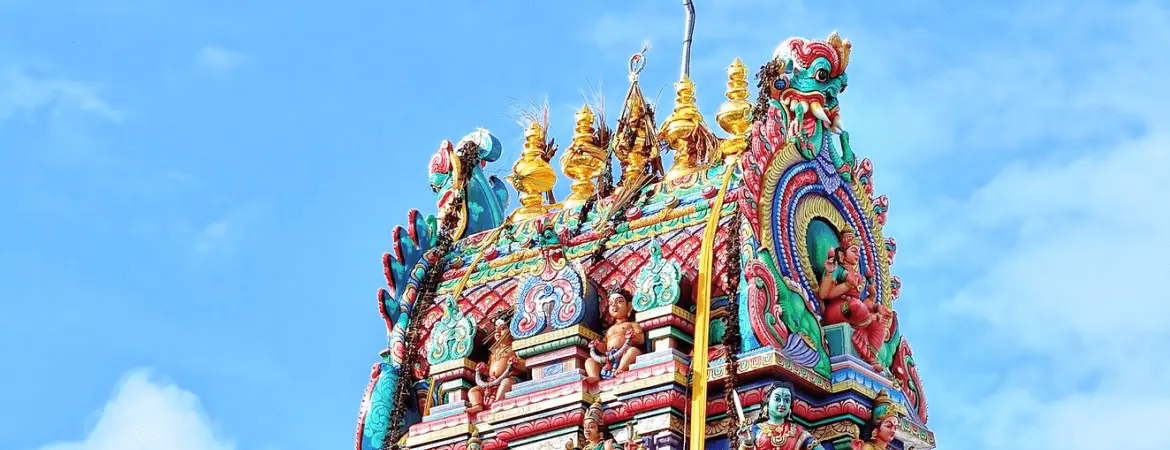 Colorful gopuram of a Hindu temple in Coimbatore, Tamil Nadu.