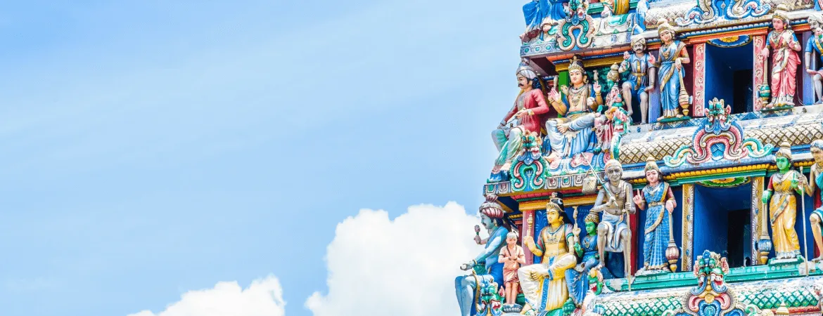 Colorful gopuram of a Hindu temple in Madurai, Tamil Nadu.